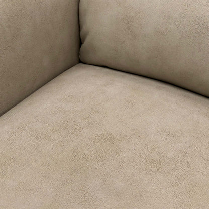 Close-up detail of the stitching and tufting on the Nixon Chair's back cushion, showing the suede fabric texture.