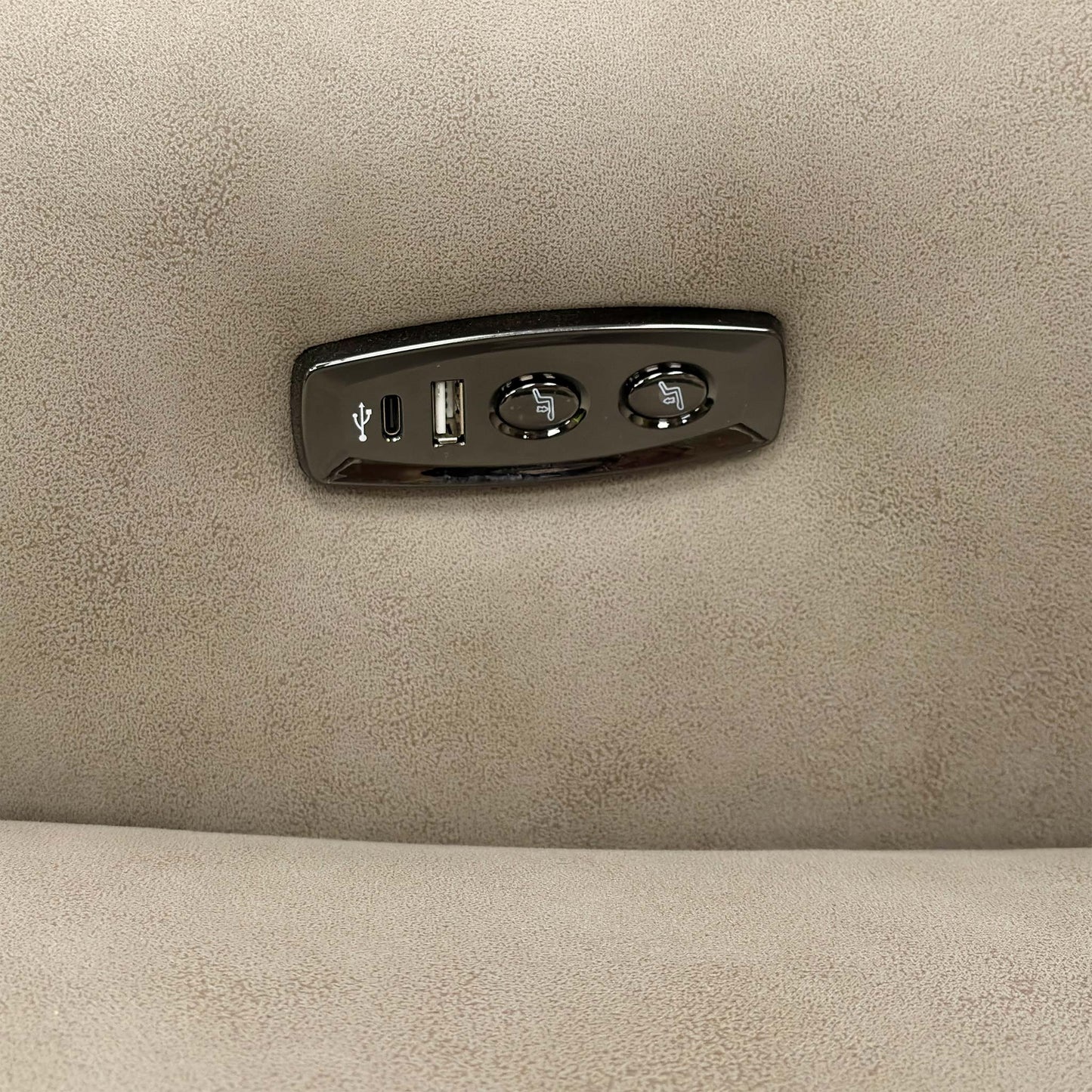 Detailed close-up of the Power Recliner's control panel, featuring the independent back/foot recline controls and the built-in USB charging port.