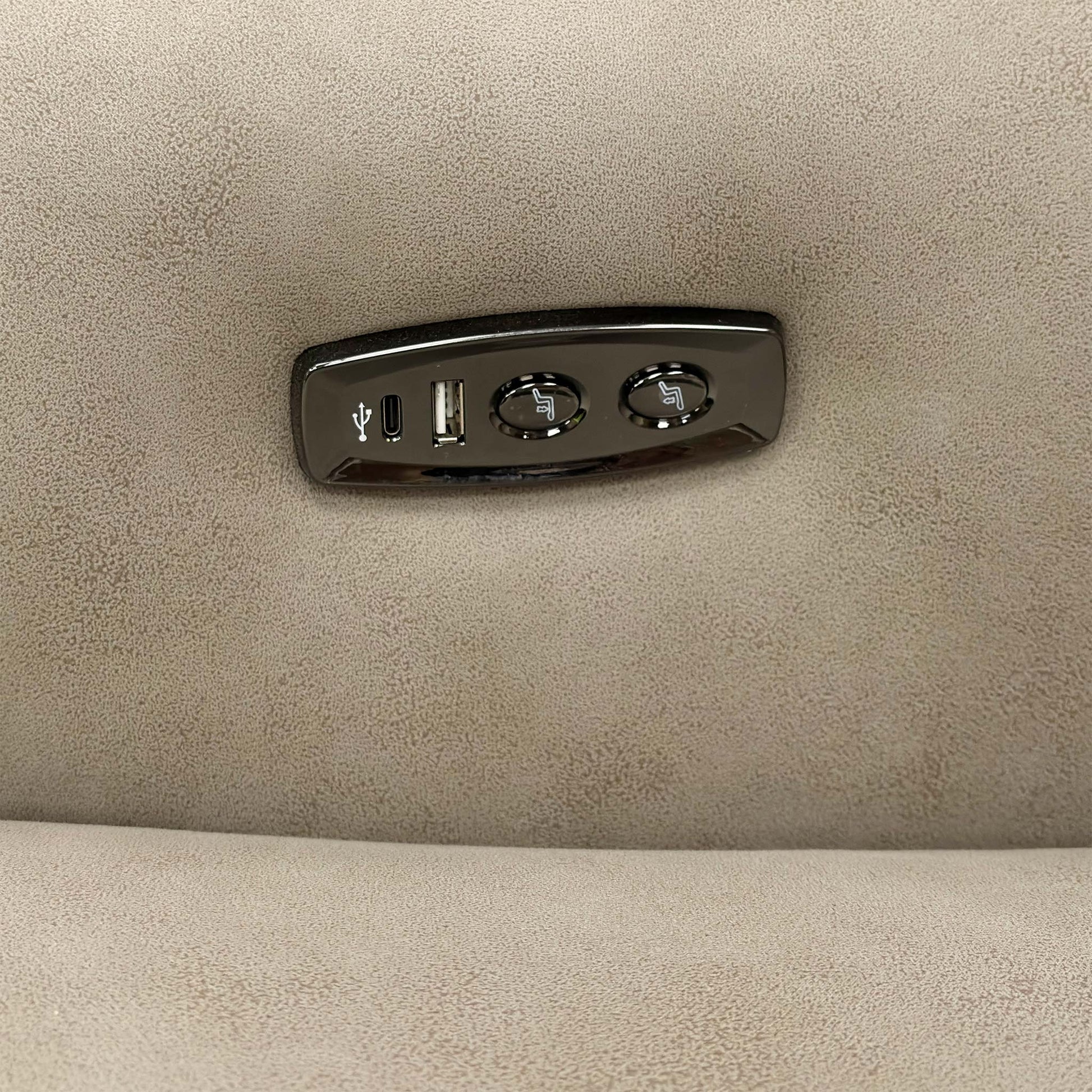 Detailed close-up of the Power Recliner's control panel, featuring the independent back/foot recline controls and the built-in USB charging port.