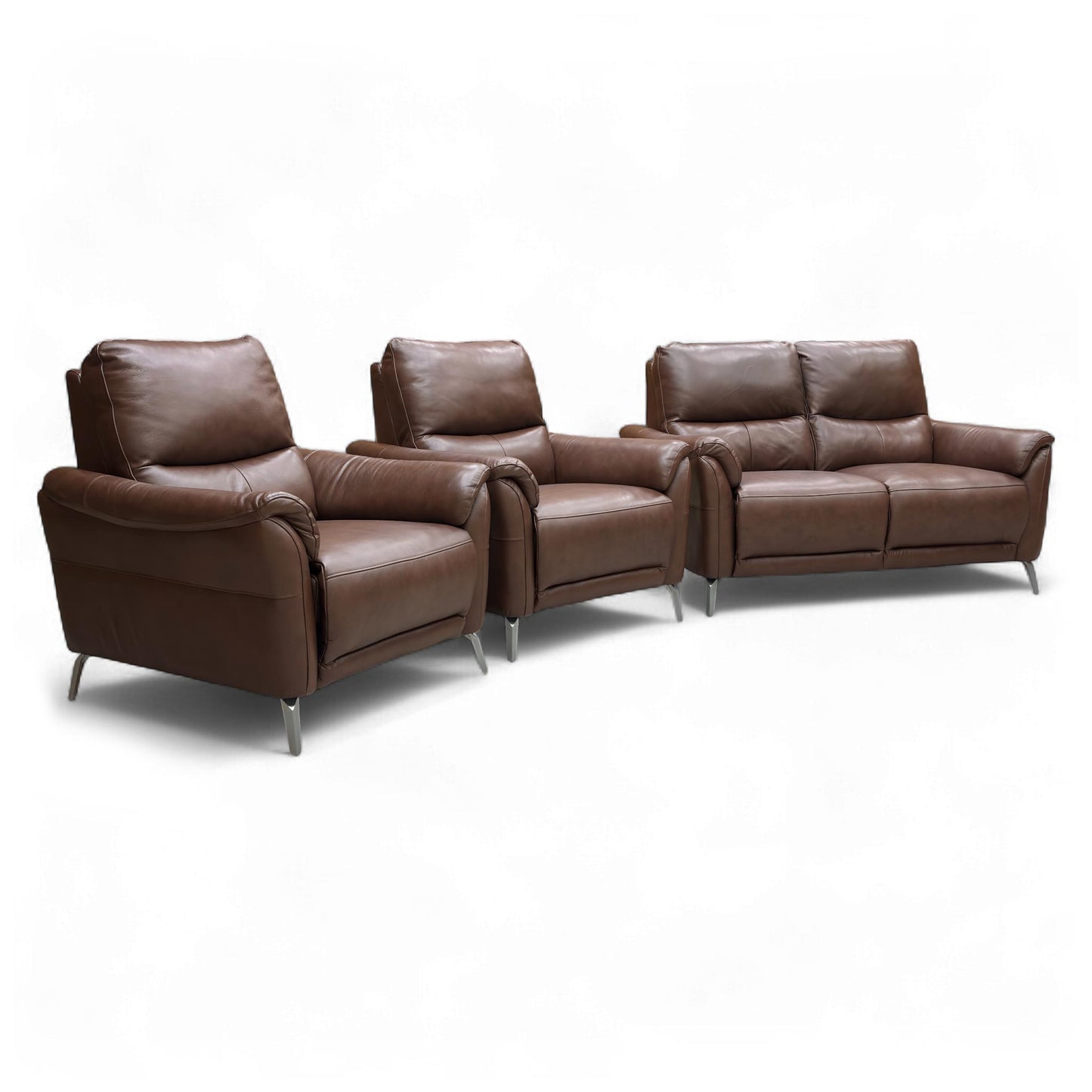 Angled view of the Daytona 2-seater sofa and one armchair, highlighting the rounded, modern design and quality butterscotch leather upholstery.