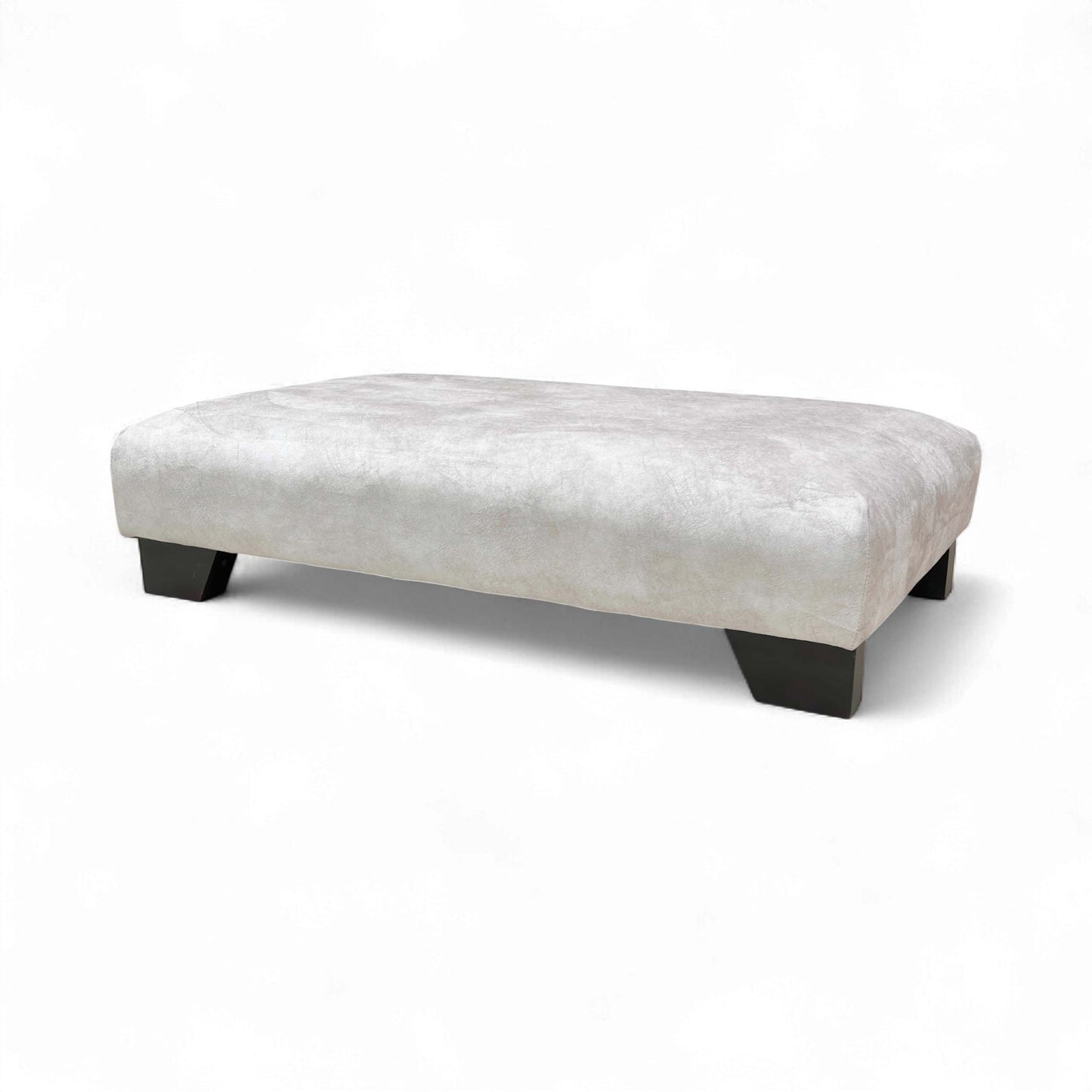 slightly angled view showing the large surface area of the Kenzo Cream Designer Footstool.