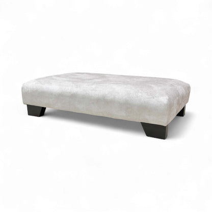 slightly angled view showing the large surface area of the Kenzo Cream Designer Footstool.
