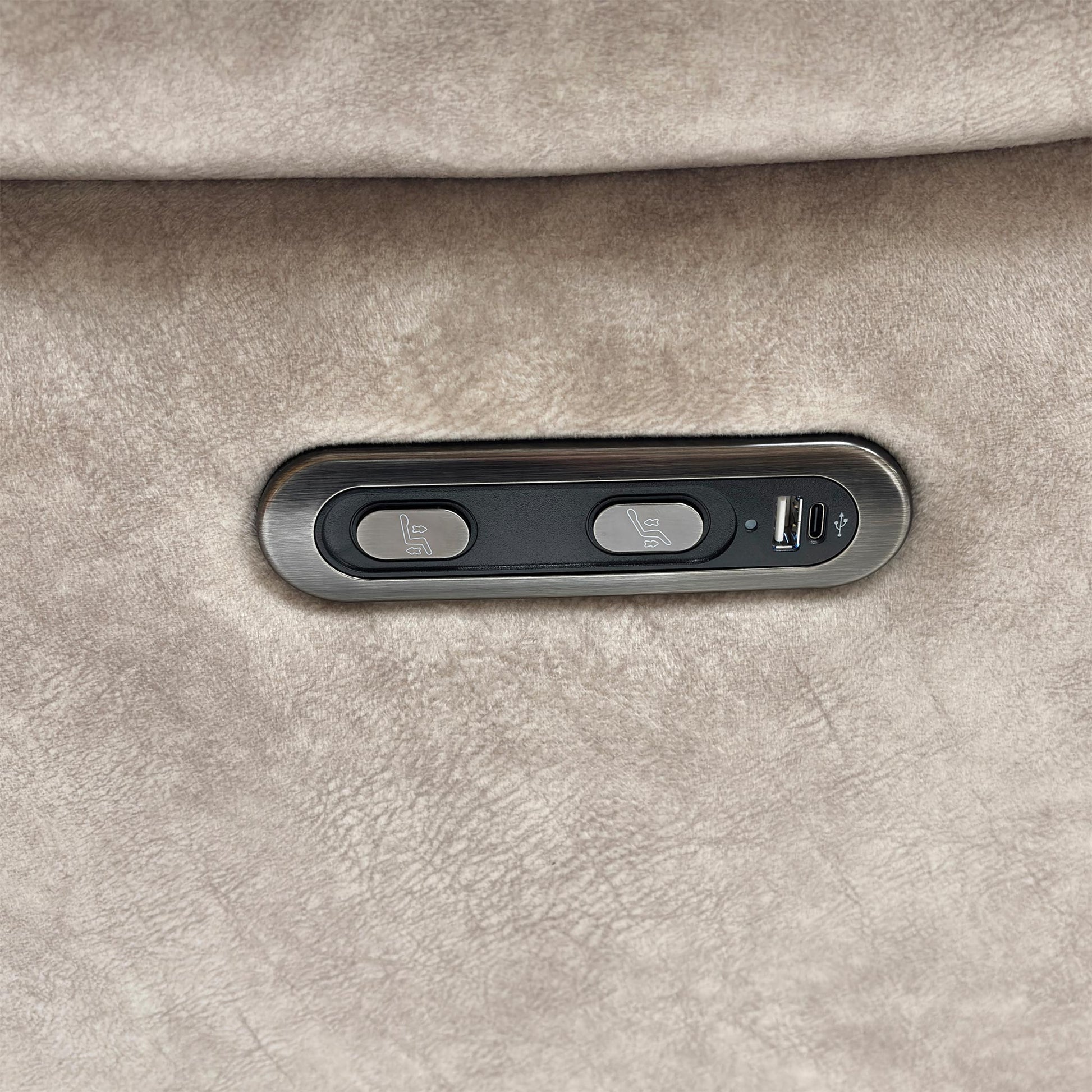 Close-up of the power recliner button.