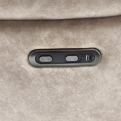 Close-up of the power recliner button.