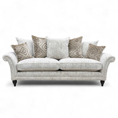 Full front view of the Grande Sofa with all scatter cushions arranged.