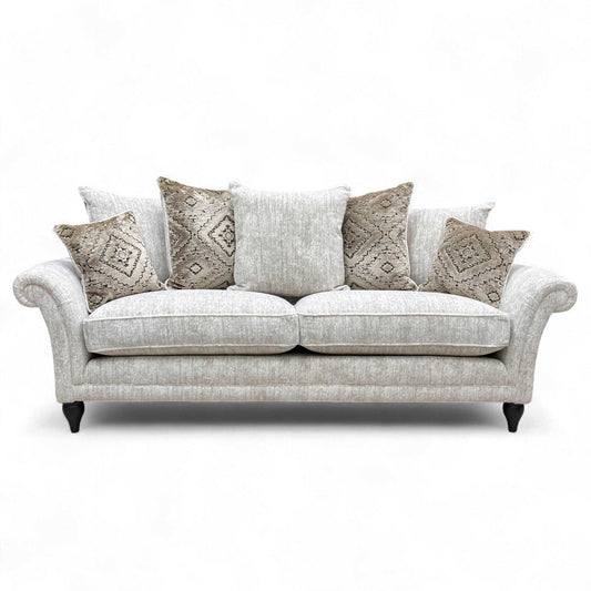 Full front view of the Grande Sofa with all scatter cushions arranged.