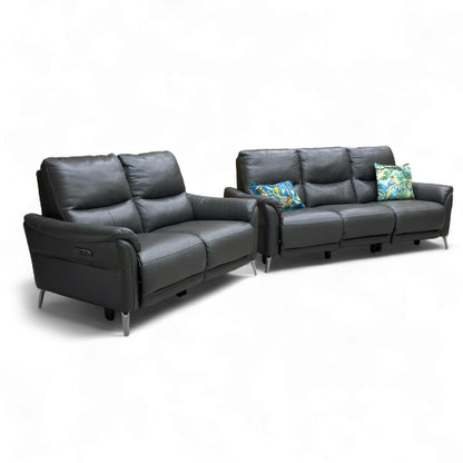 Side view of the sofa set, showing the stylish modern silhouette and gentle curves of the armrests.
