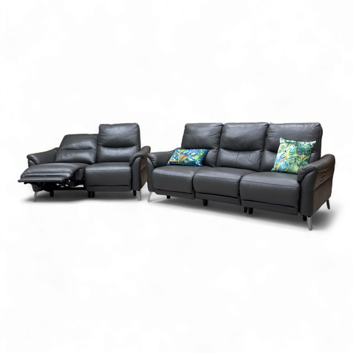 Angled view of the sofa set, showing the stylish modern silhouette and gentle curves of the armrests.