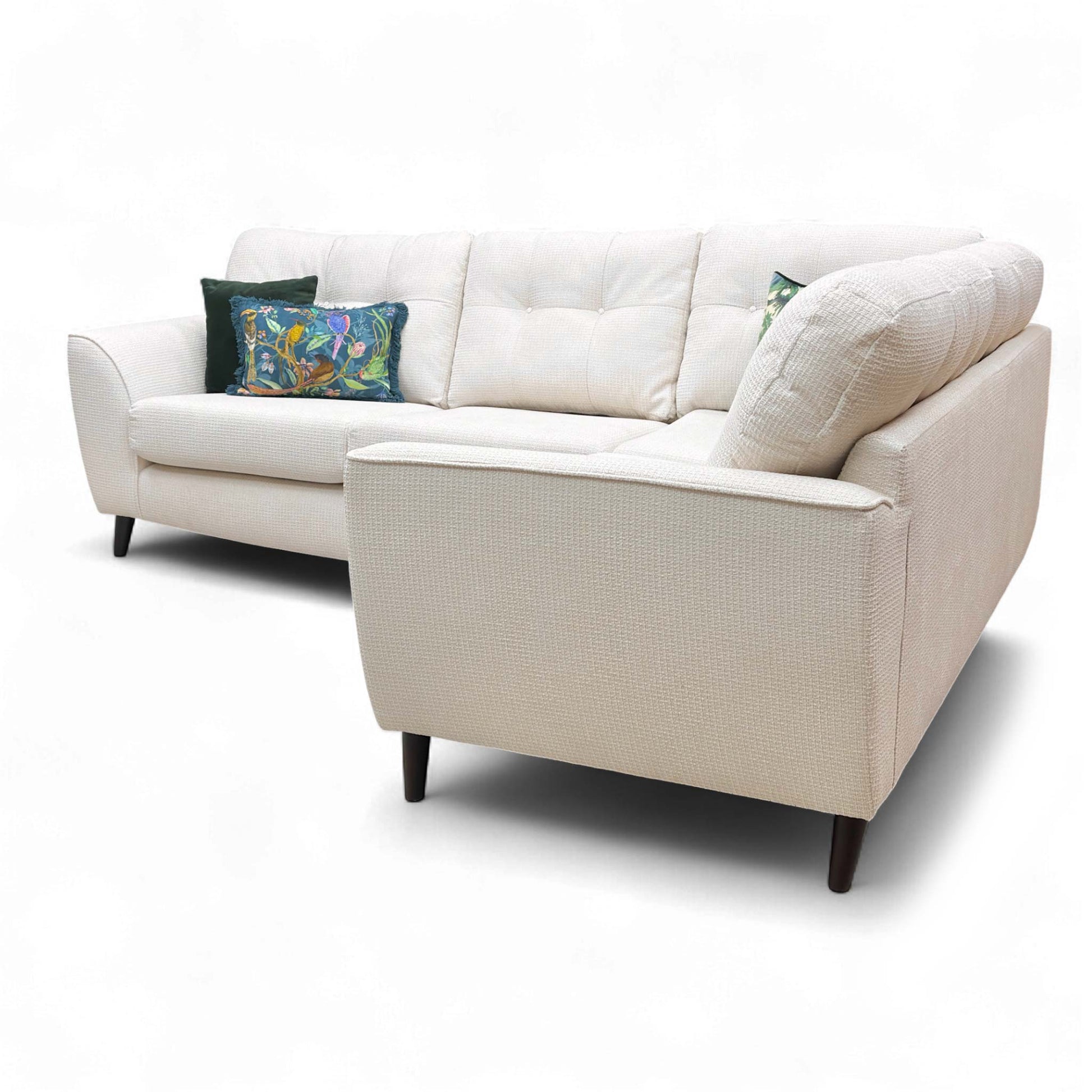 View of the corner section, emphasizing the generous chaise depth (212 cm) for lounging.