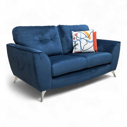 Angled view highlighting the soft, tactile Navy Velvet fabric and the clean lines of the armrests and cushions.