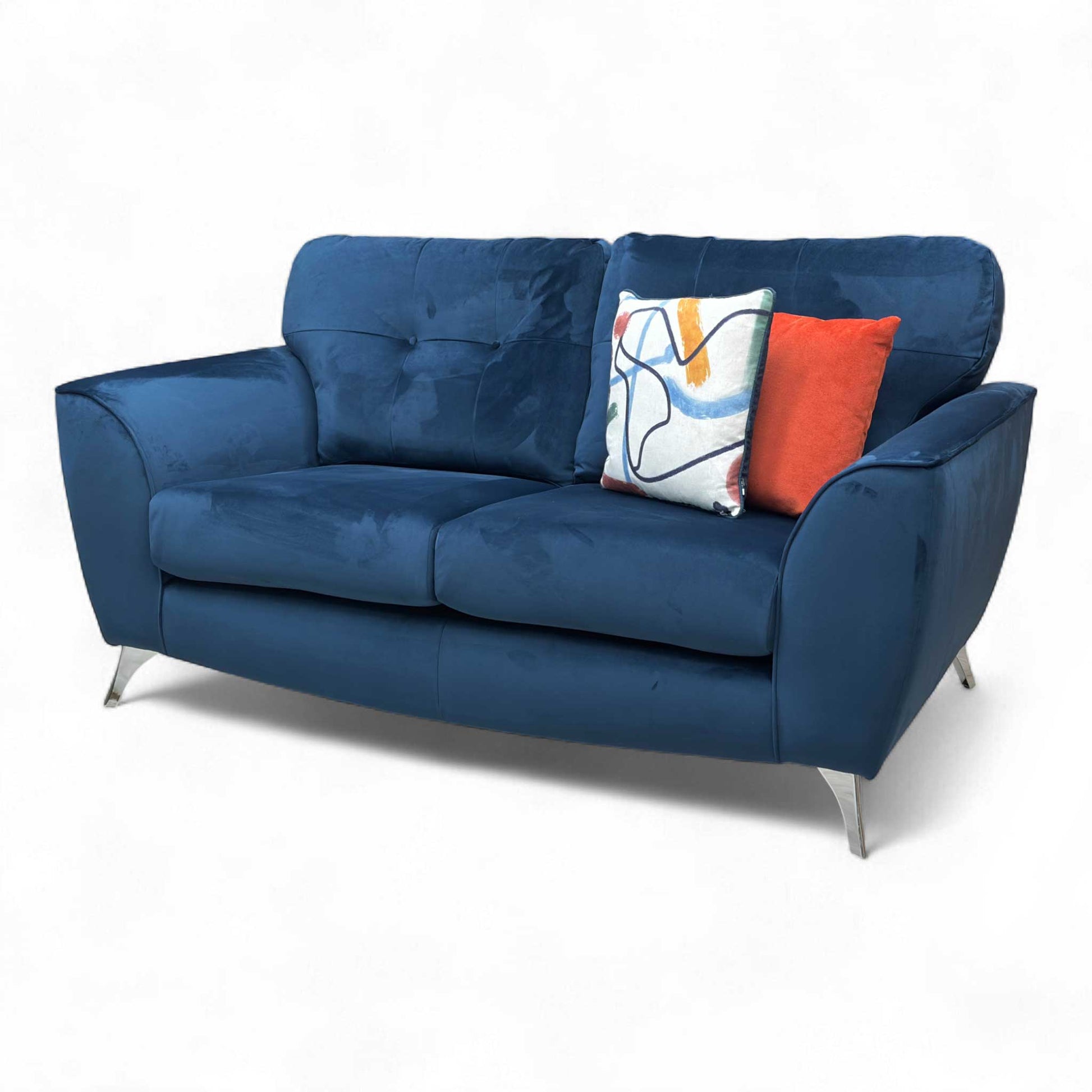 Angled close-up of the sofa's armrest and cushion.