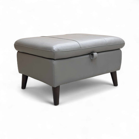 Angled view of the closed Elephant Leather Footstool, showcasing its sleek, modern design.