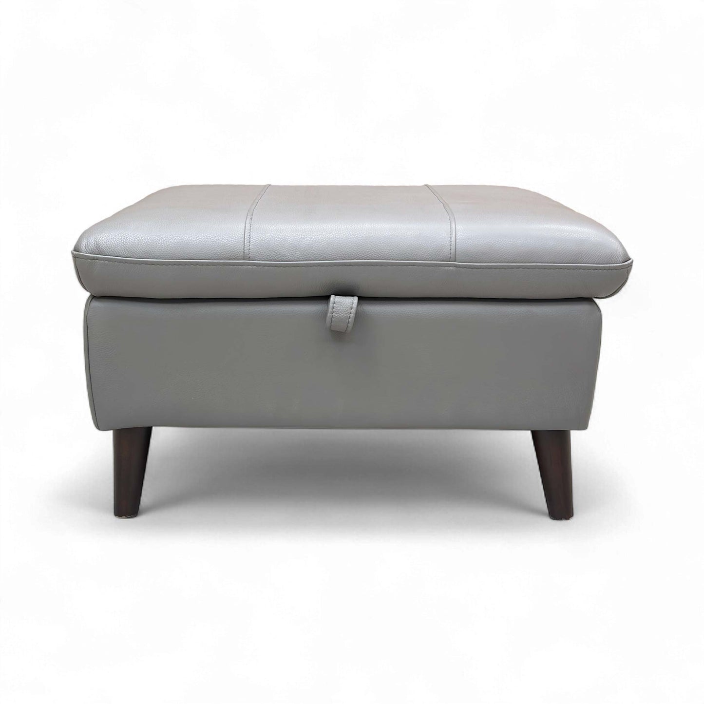 Full view of the 'Winner' Oslo Storage Footstool upholstered in Elephant Leather, resting on tapered wood legs.