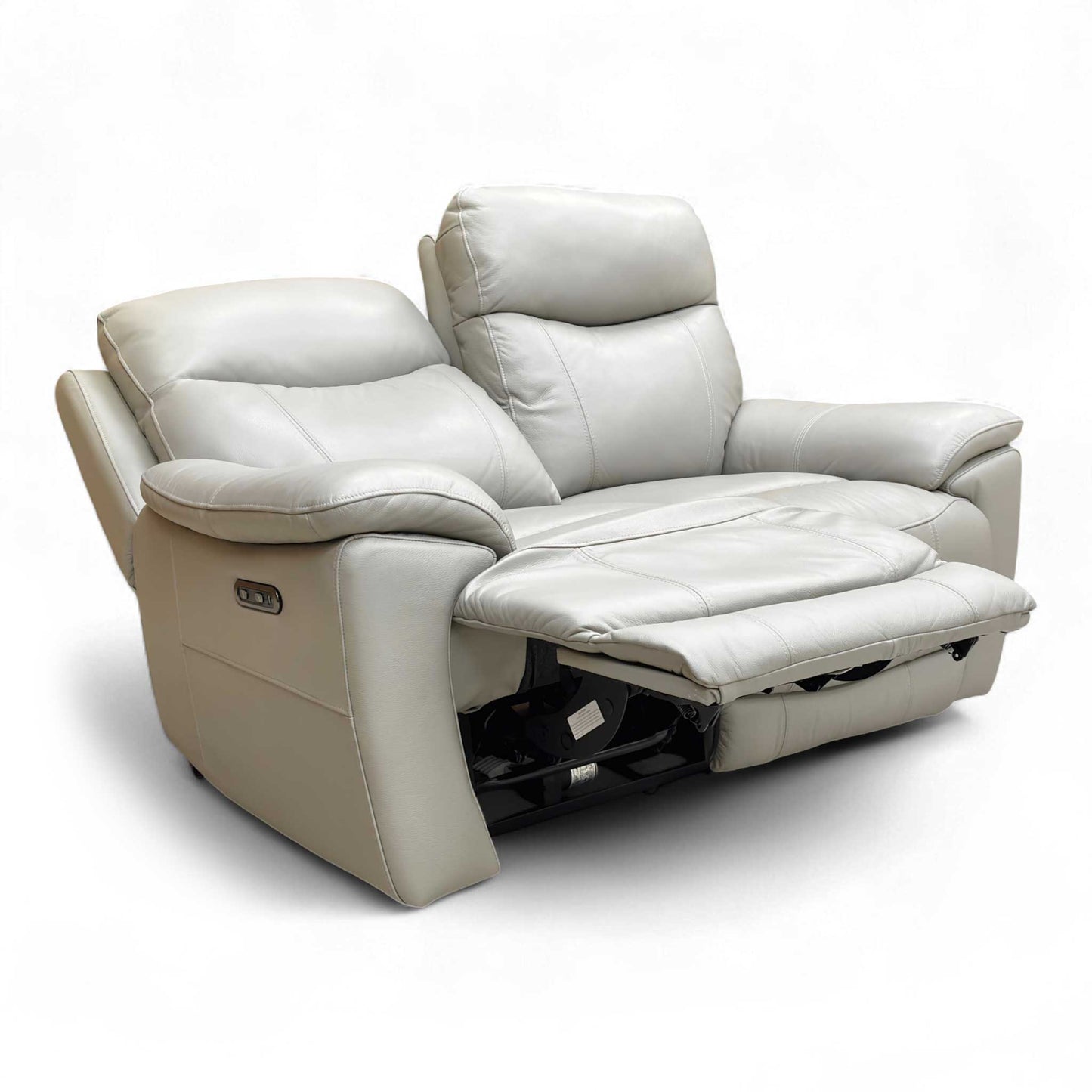 Side view showing the armrest and profile.