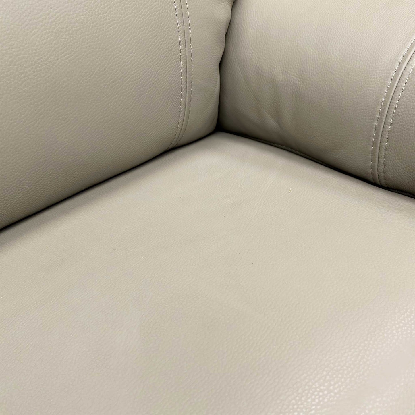 Close-up of the control panel on the side of the sofa.