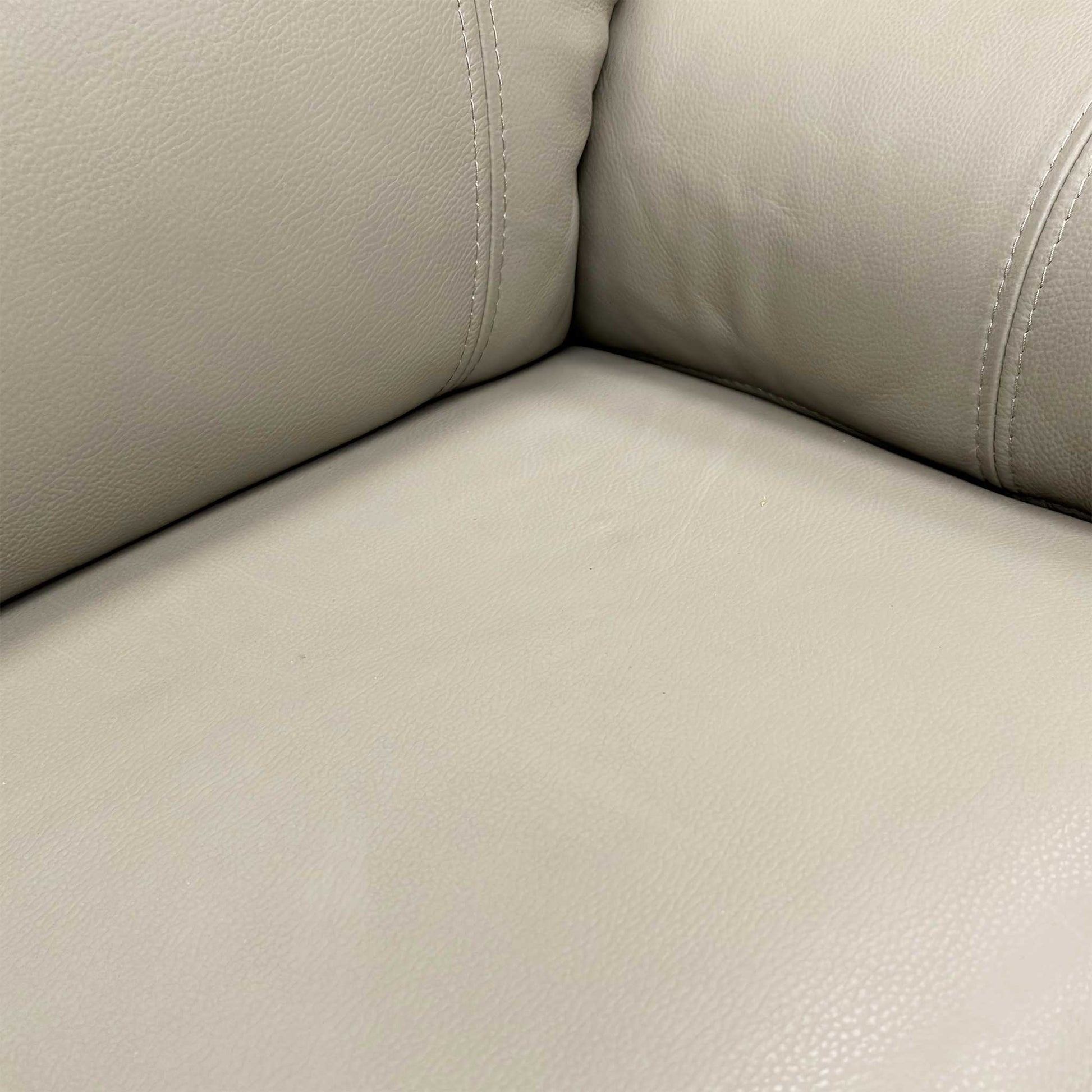 Close-up of the control panel on the side of the sofa.