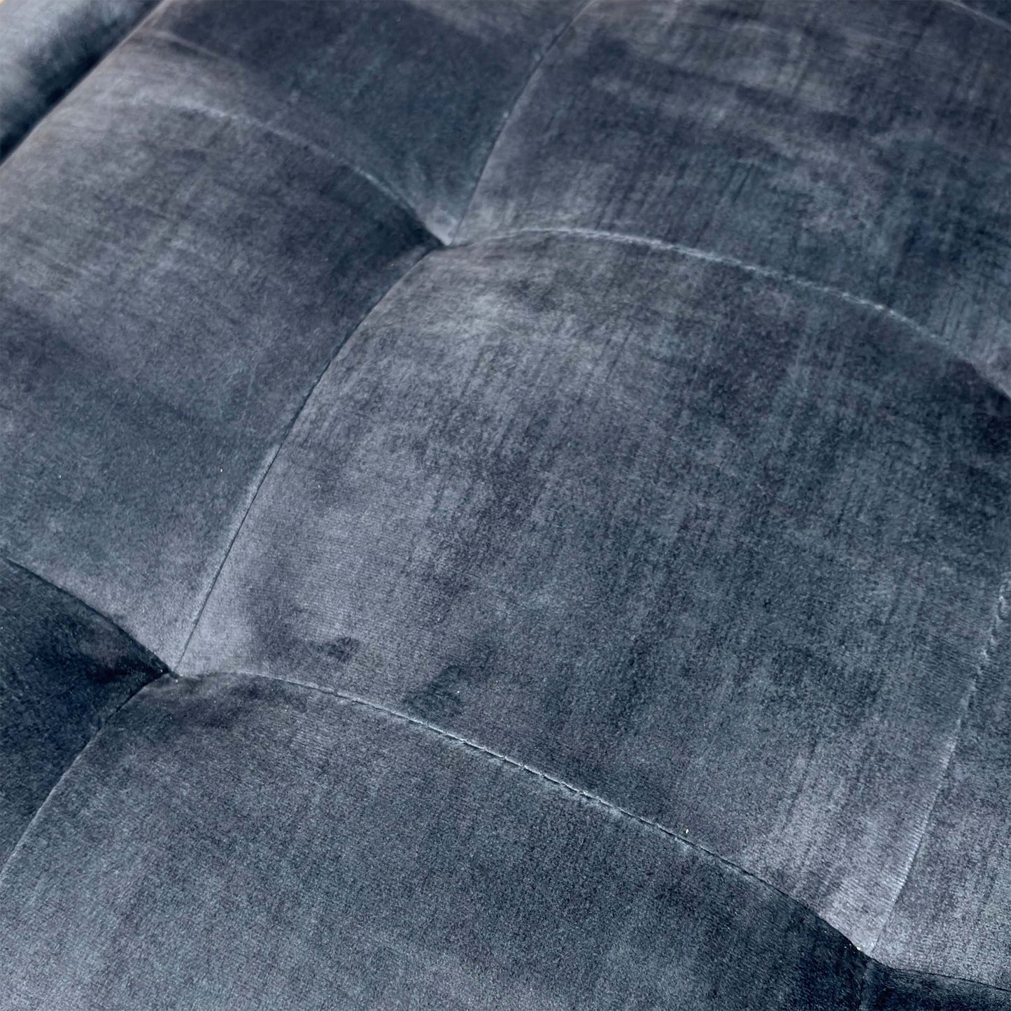 Close-up of the fabric and surface detail.