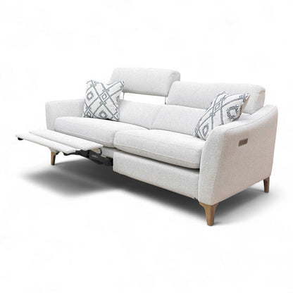 View of the sofa with the power recliner footrests extended.