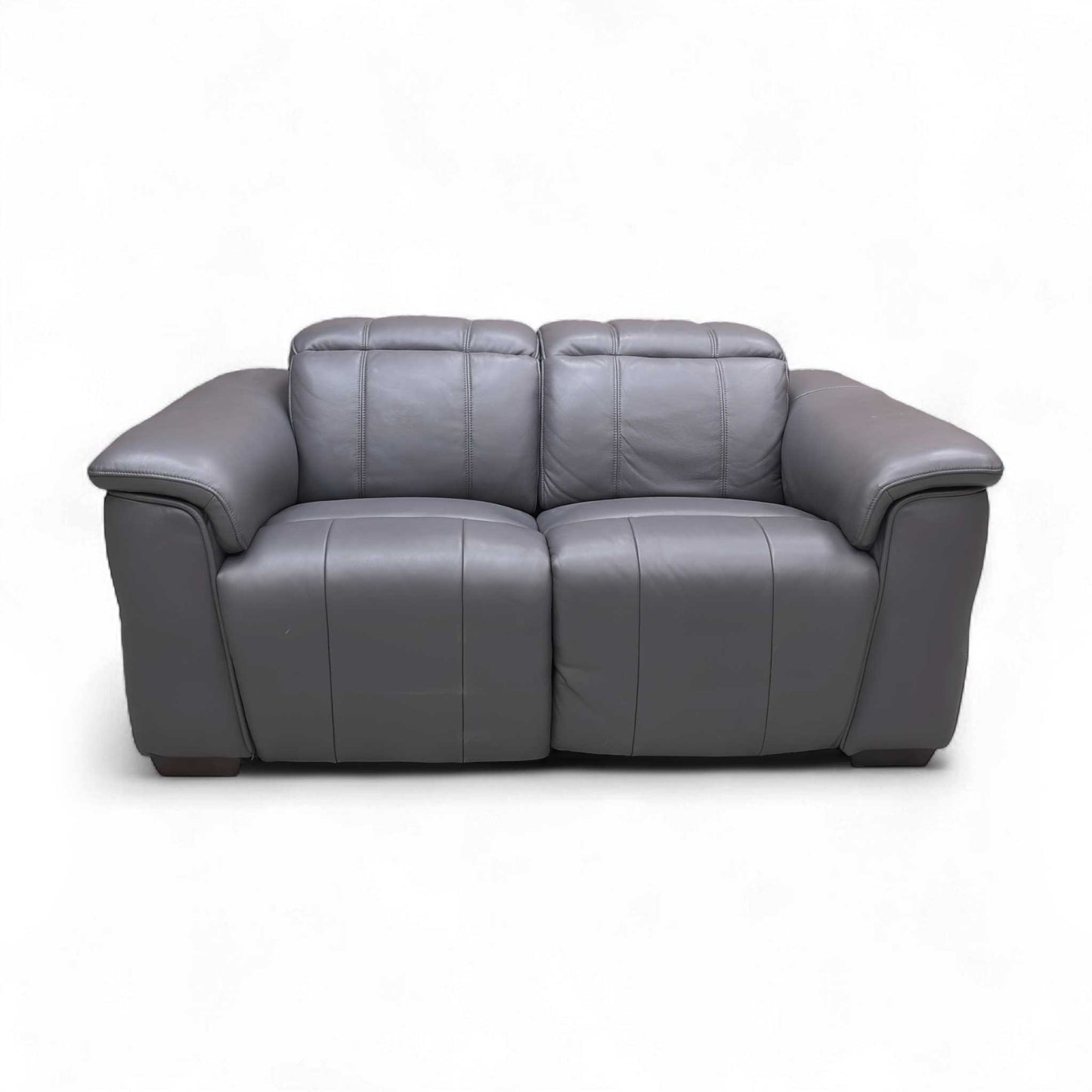 Full view of the 'Inca' 2 Seater Sofa upholstered in Navy Leather, with power headrests retracted.