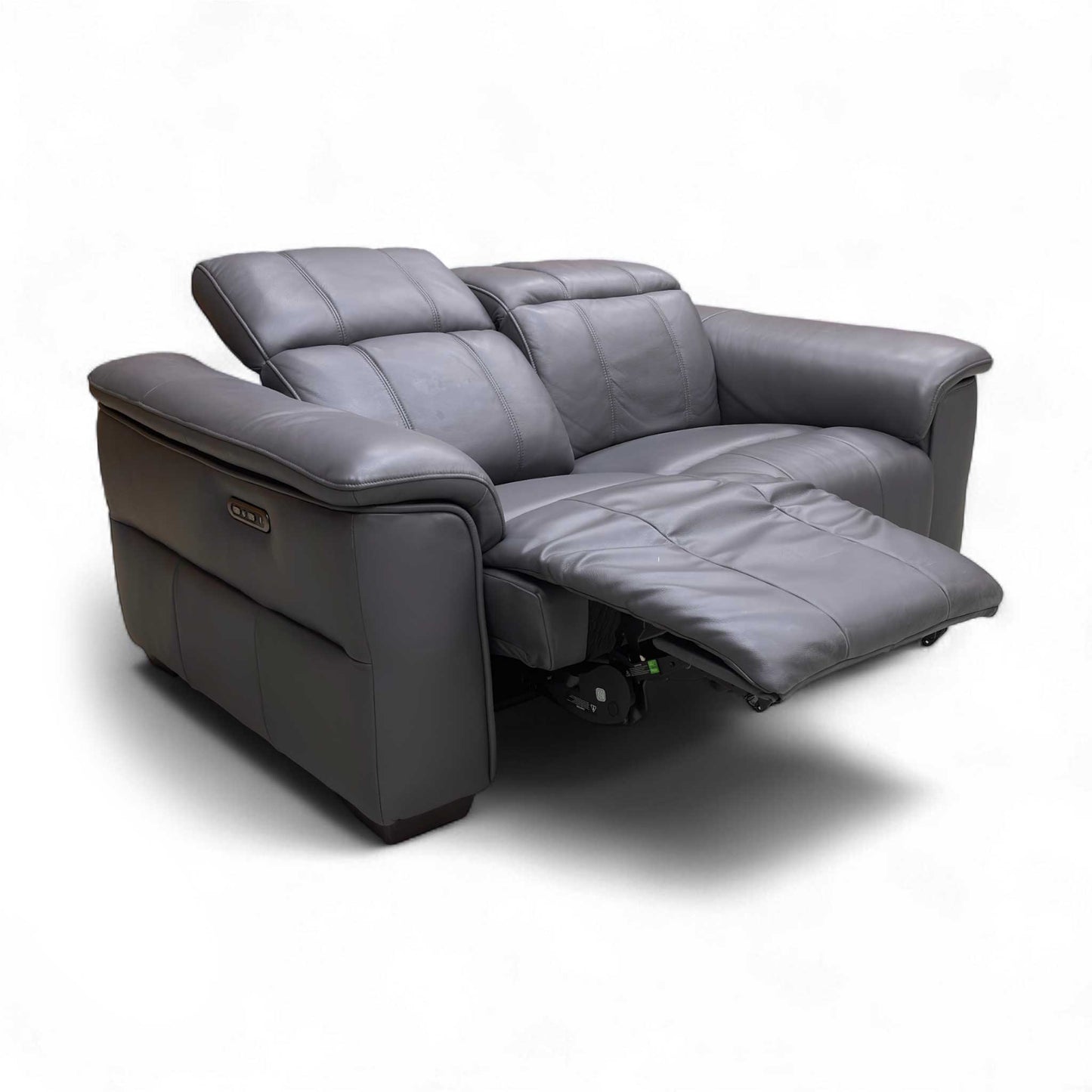 The Navy Leather Power Recliner Sofa with the footrests extended and power headrests adjusted for optimal comfort.