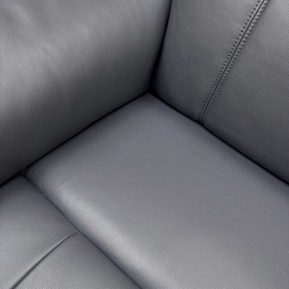 Close-up detail of the Navy Leather upholstery and stitching, showing the Cat-60:24 grade.