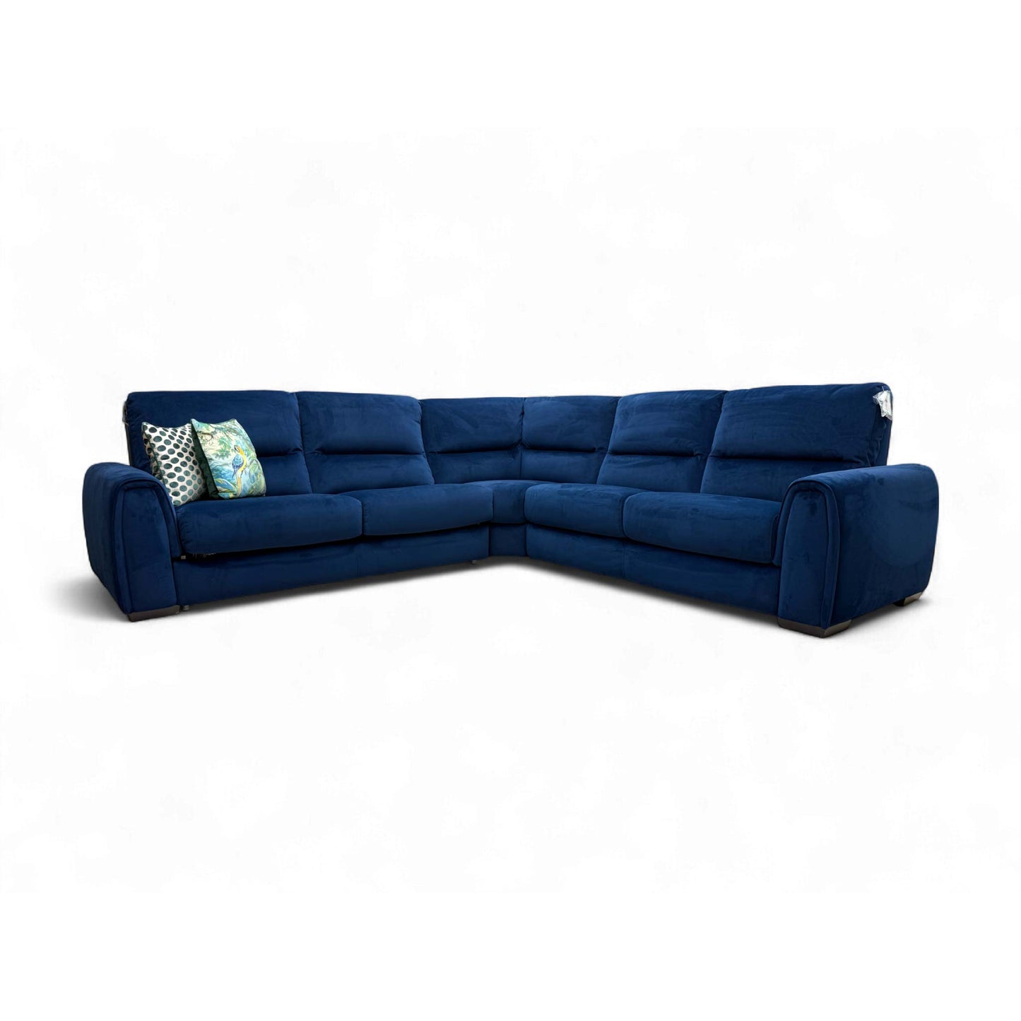 Full front view of the large corner sofa in navy velvet.