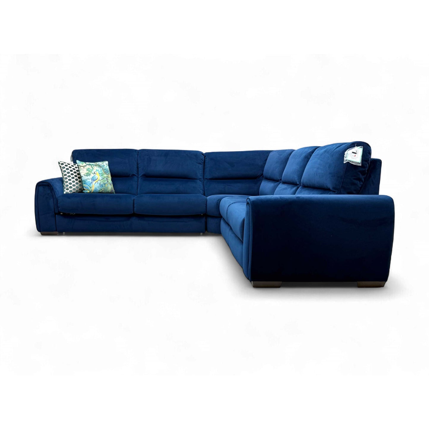 Lifestyle shot of the 'Flex' Corner Sofa being enjoyed, demonstrating the Power Recliner feature.