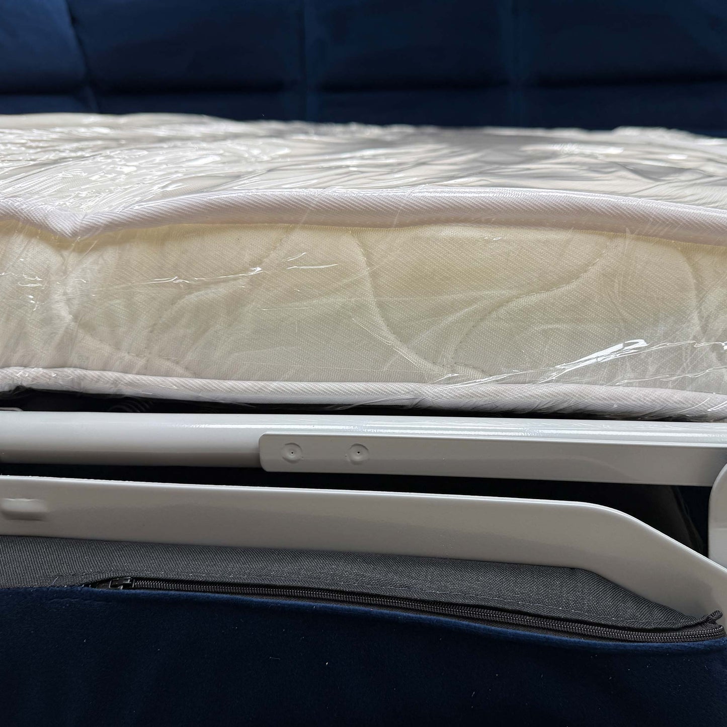 The corner sofa converted into the bed position.