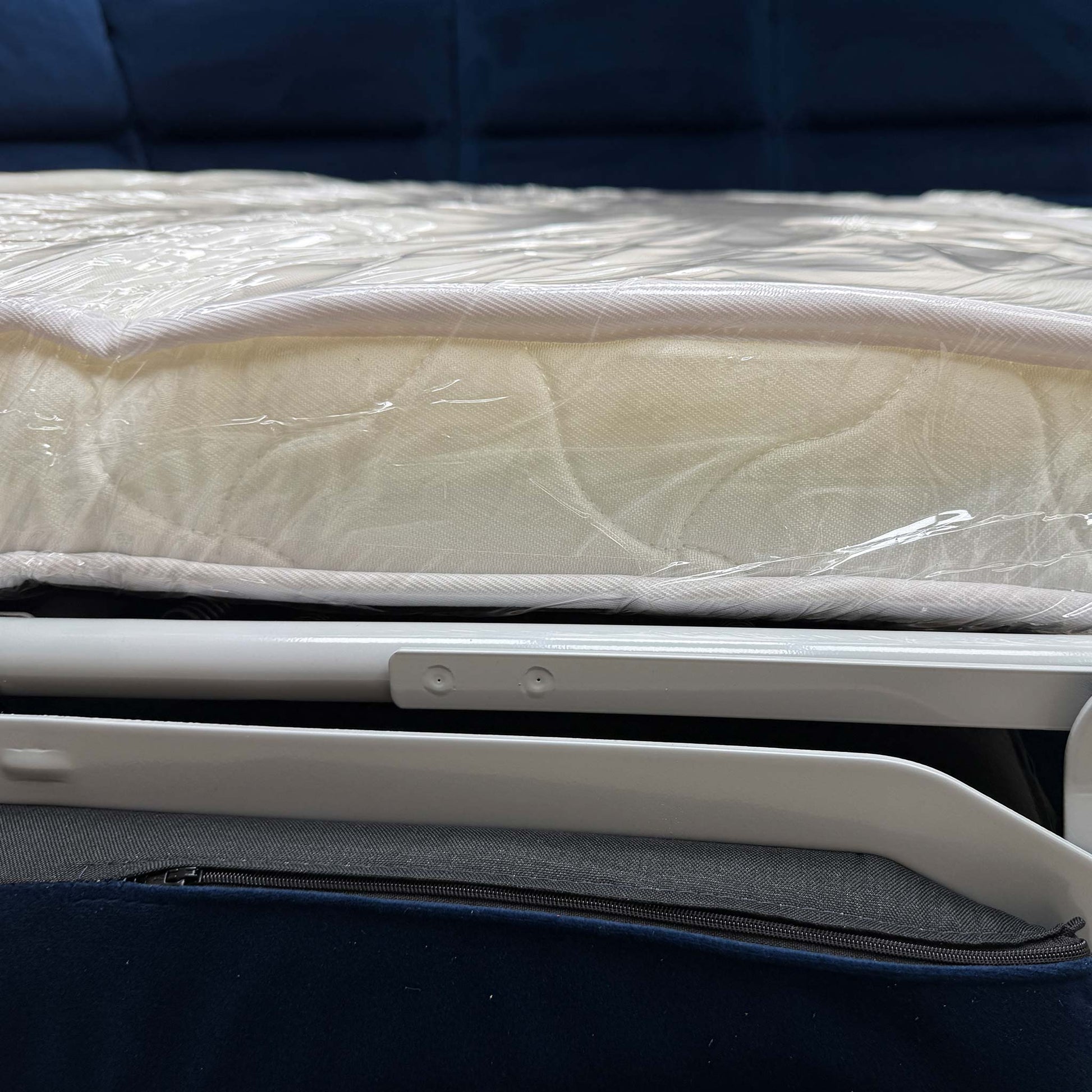 The corner sofa converted into the bed position.