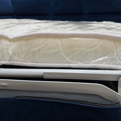 The corner sofa converted into the bed position.