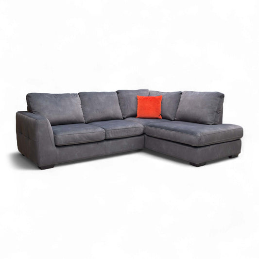Angled view showcasing the deep comfort of the chaise end, with pocket spring and foam seating.