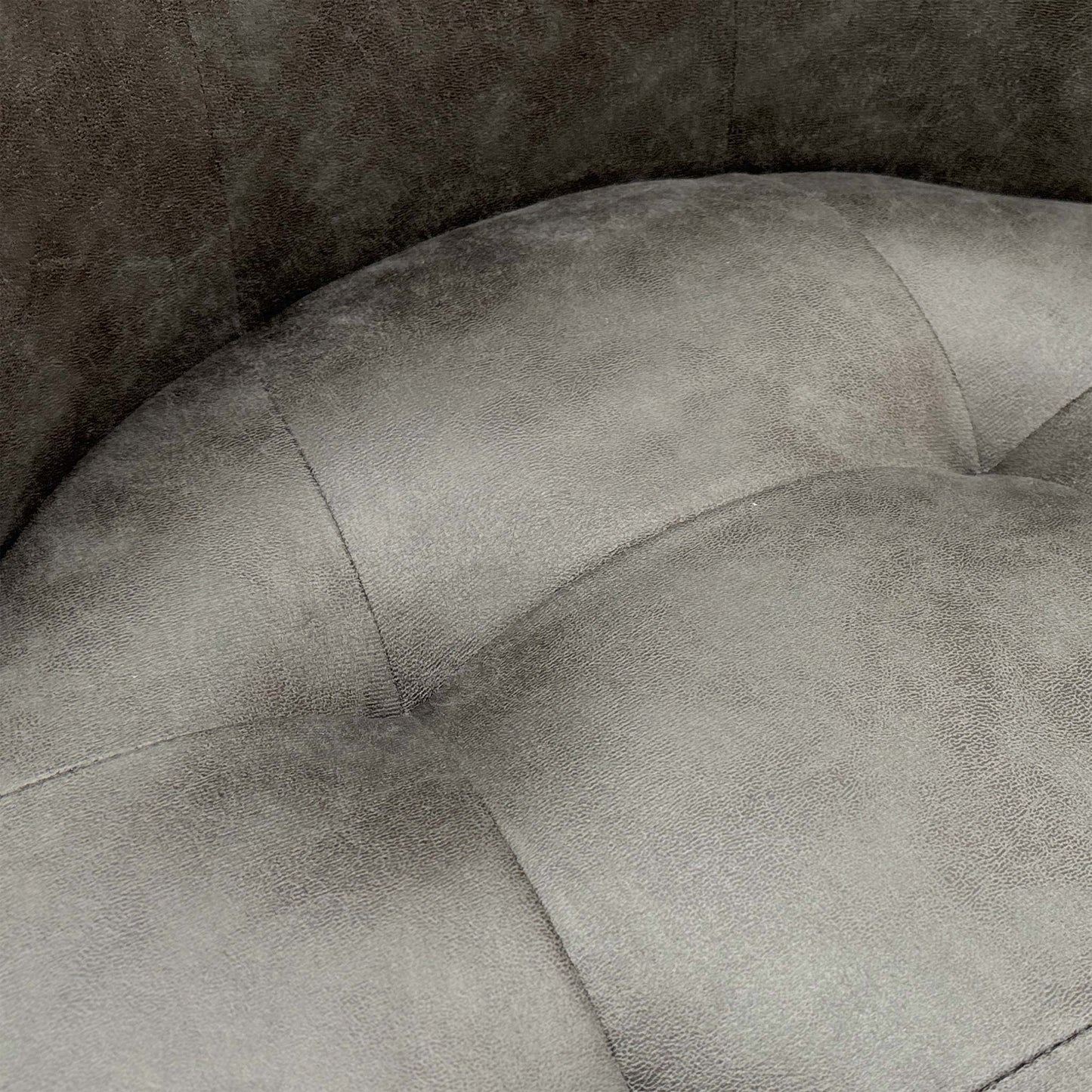 Close-up showing the suede fabric texture and the subtle back buttoning.