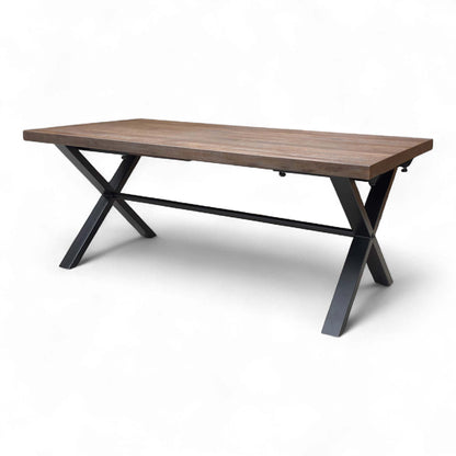 Detailed view of the modern Black Metal X-Shaped Legs and the junction with the solid oak table top.