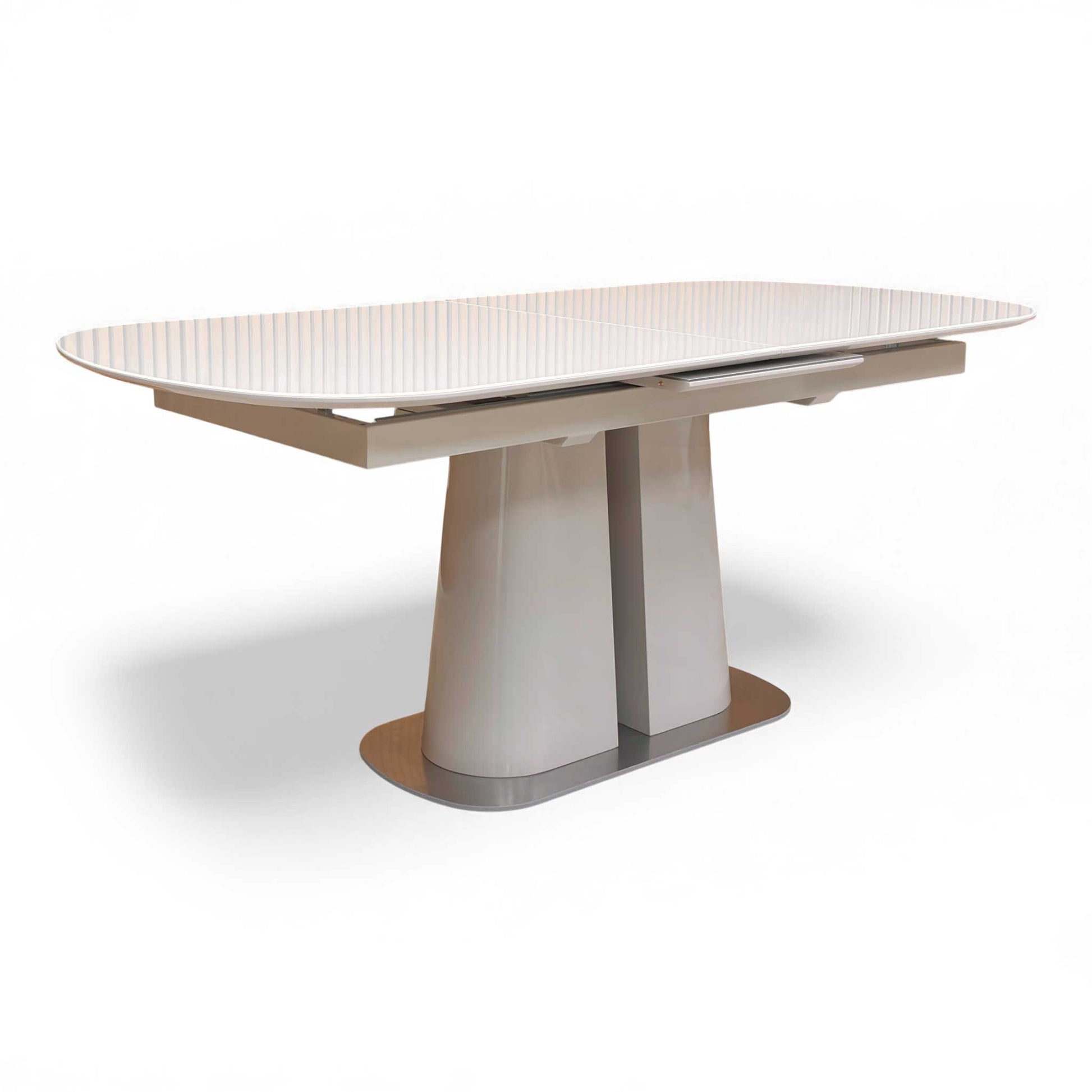 Angled view of the table in its closed, 180cm state, highlighting the high gloss finish.