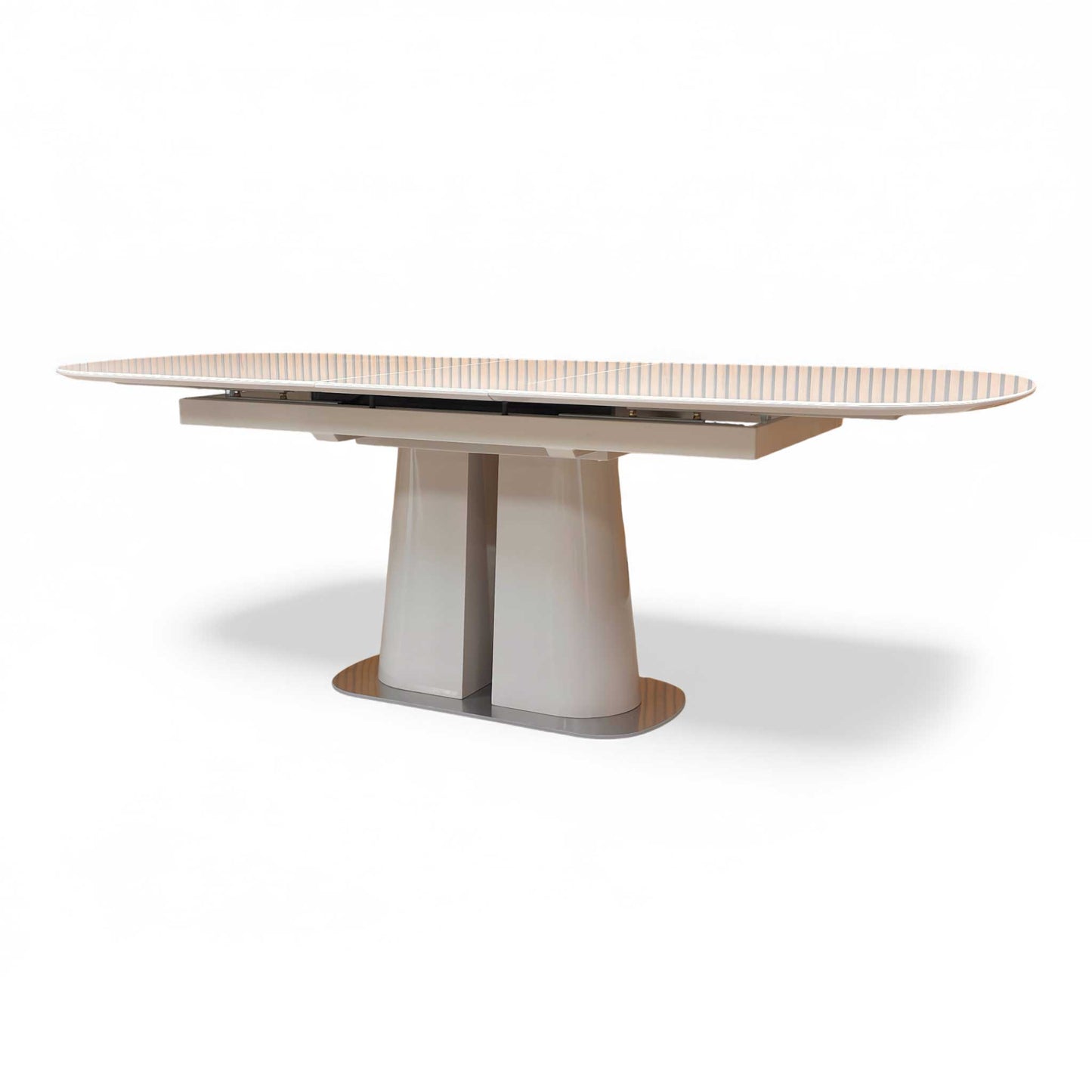 The table shown extended to 220cm.