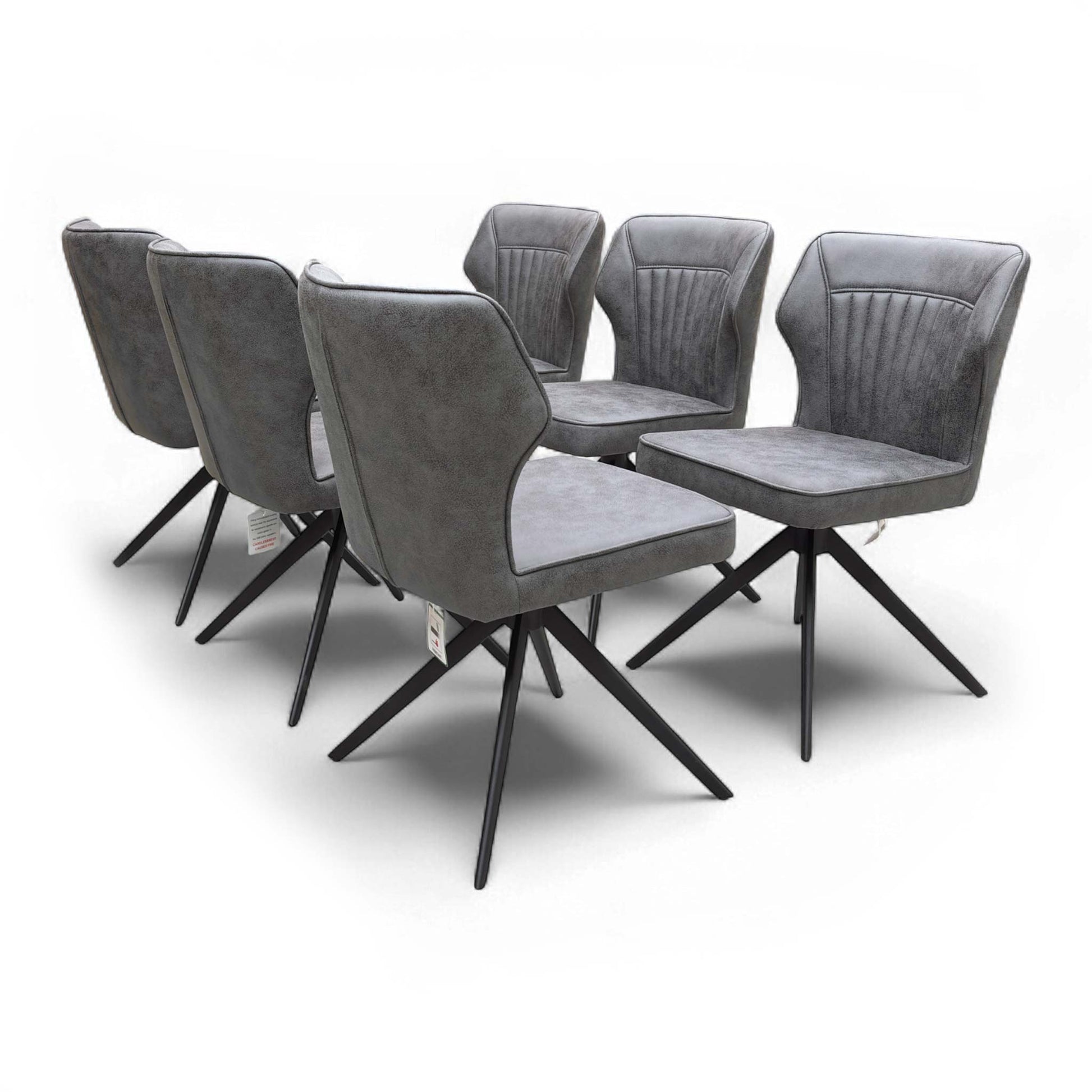 Detailed shot of the Soft Faux Leather upholstery and the decorative stitching detail on the chair back.