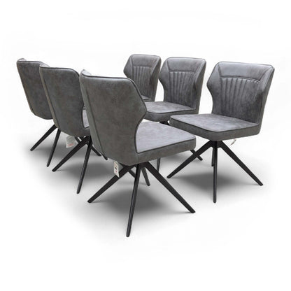 Detailed shot of the Soft Faux Leather upholstery and the decorative stitching detail on the chair back.