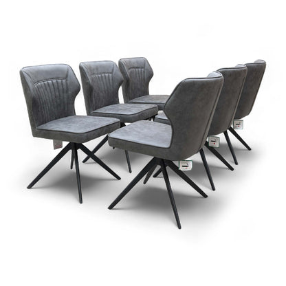 Angled view of the Dark Grey Faux Leather Swivel Chair, highlighting the seat cushioning and back design.