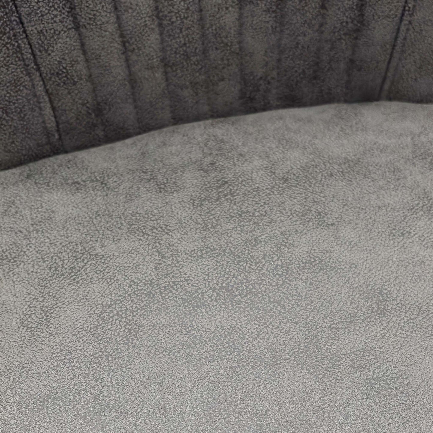 Close-up of the swivel base and matt black legs.