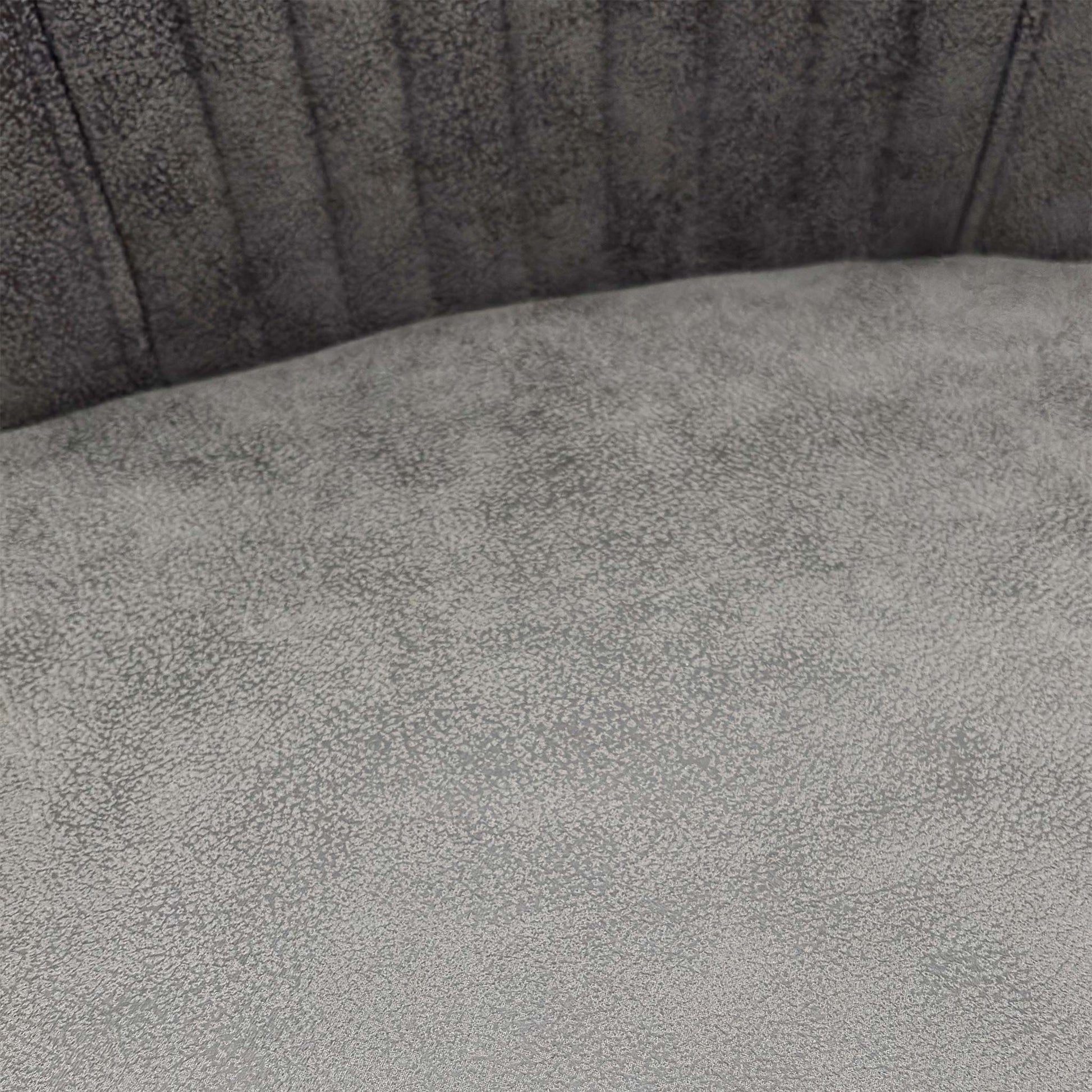 Close-up of the swivel base and matt black legs.