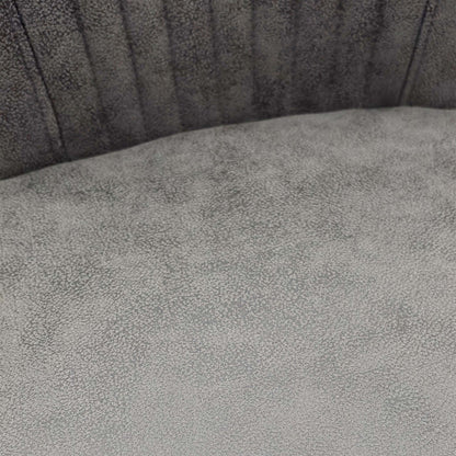 Close-up of the swivel base and matt black legs.