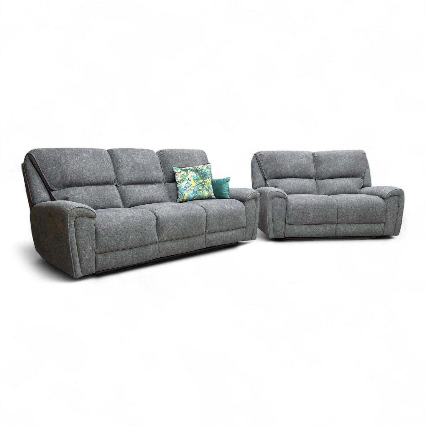 Side profile of the 'Ricky' sofa, showing the high back and padded arm style.