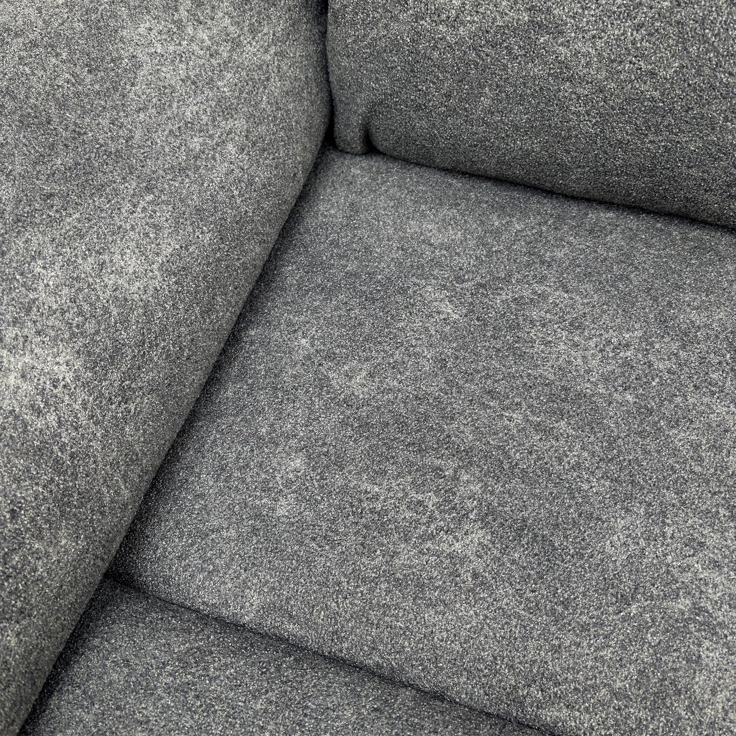 Detail shot of the plush Teddy Velvet fabric texture in Charcoal Grey.