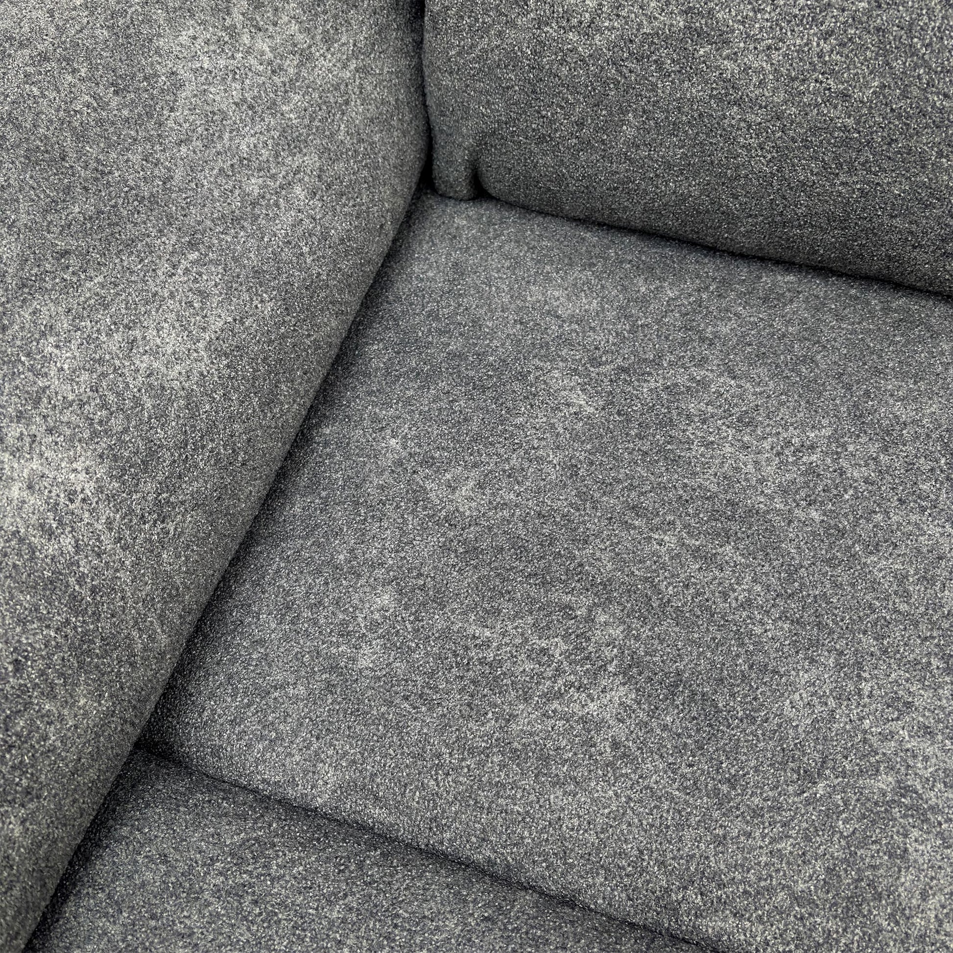 Detail shot of the plush Teddy Velvet fabric texture in Charcoal Grey.