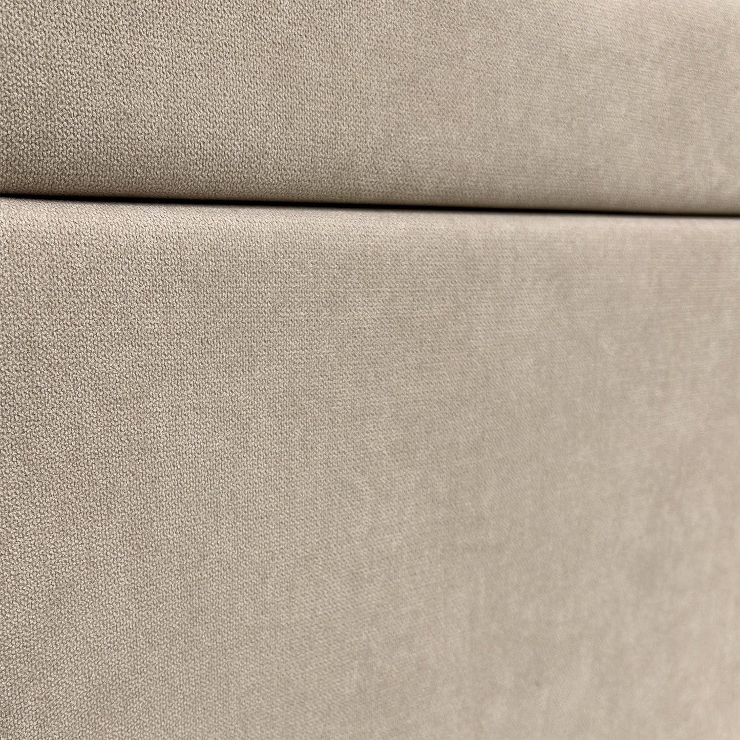 Detailed close-up of the soft and luxurious Mink Fabric upholstery texture.