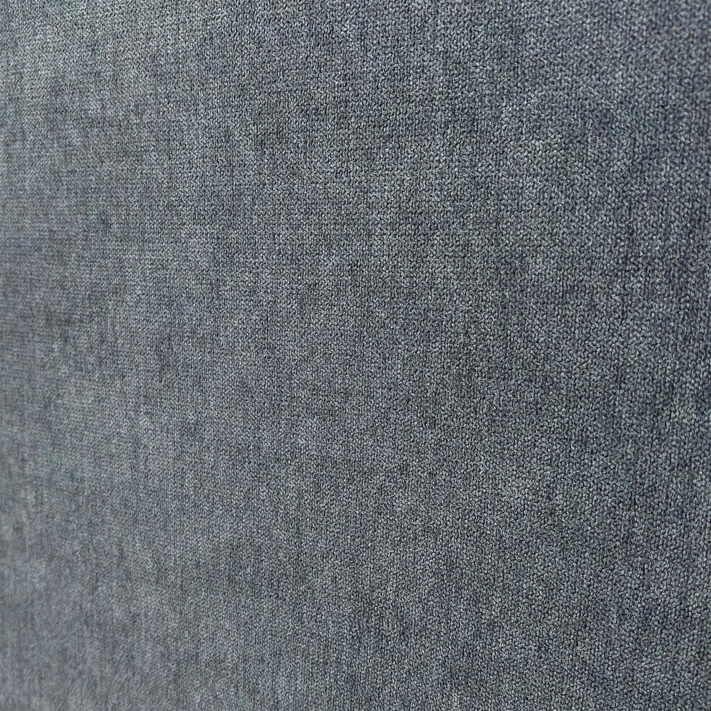 Close-up view of the smooth Carbon Velvet finish and the handle for one of the storage drawers.