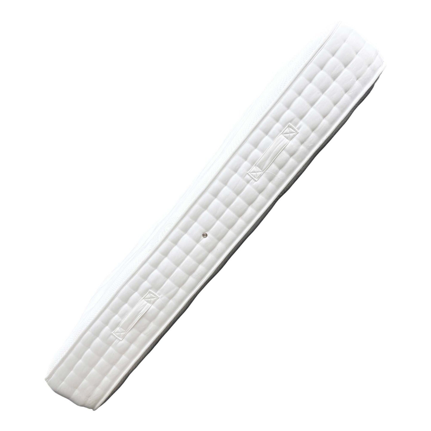 Detail shot of the mattress corner, showing the finish and edge.