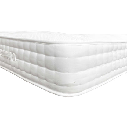 Close-up of the mattress's tufted surface, illustrating the quality and feel of the cover.