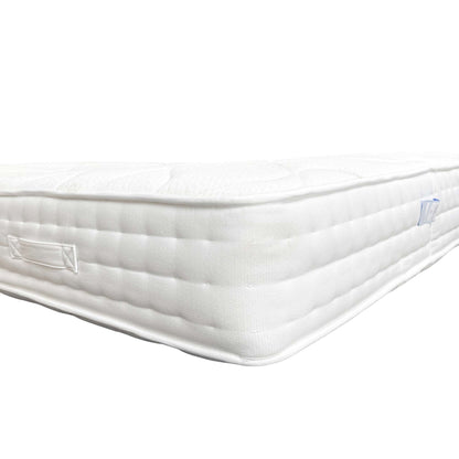 Close-up of the mattress's tufted surface and the feel of the ultra-soft cashmere blend cover.