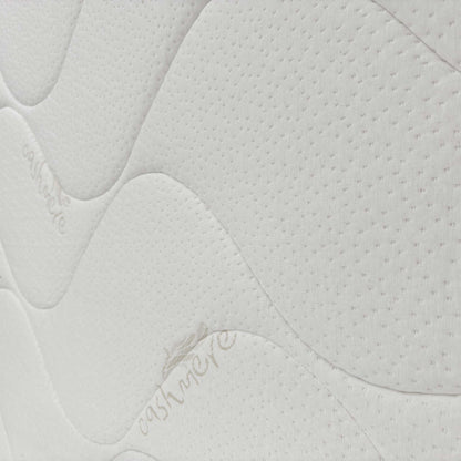 Close-up of the mattress side, emphasizing the quality stitching and construction of the extra firm support system.